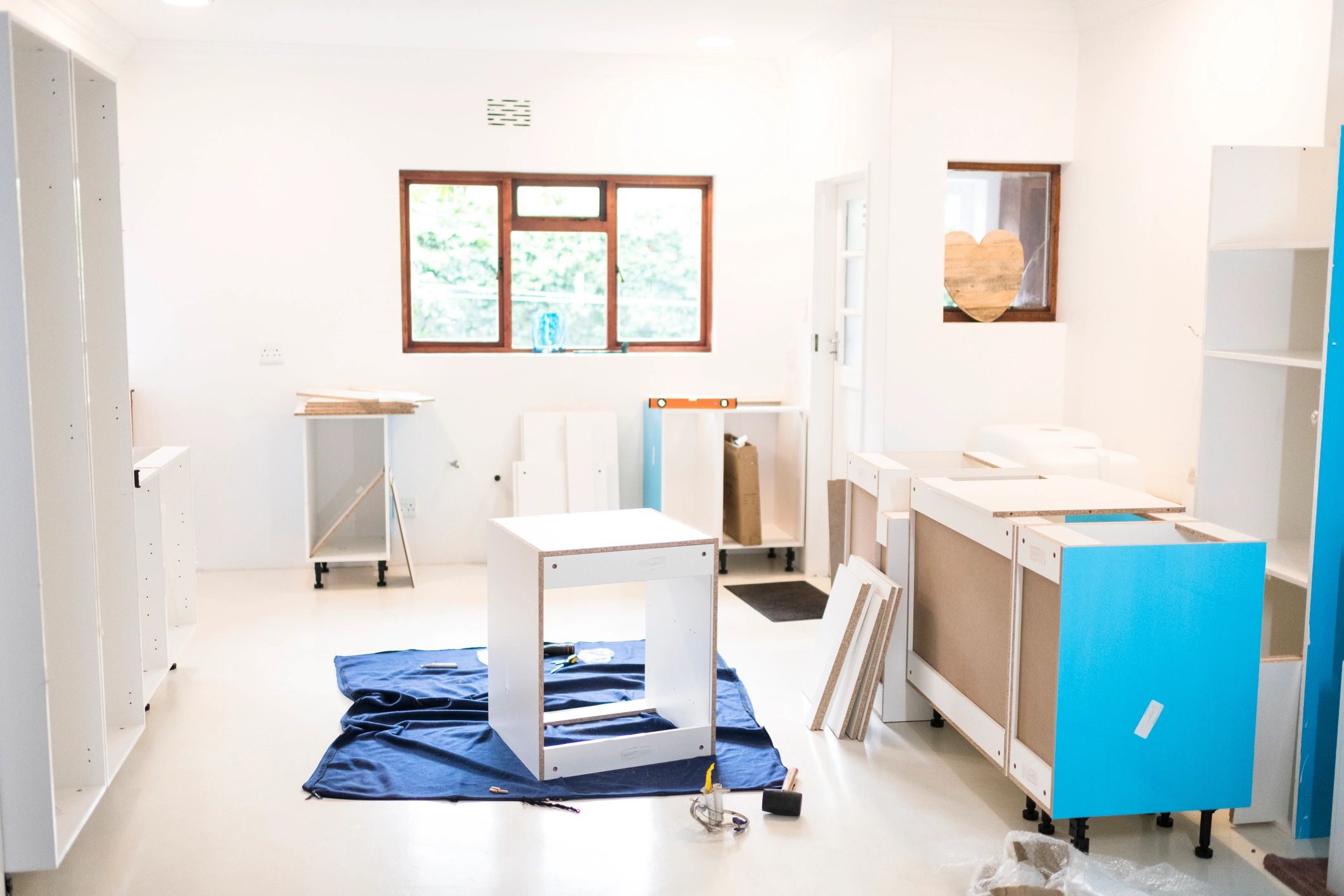Cabinet installation in progress representing a renovation