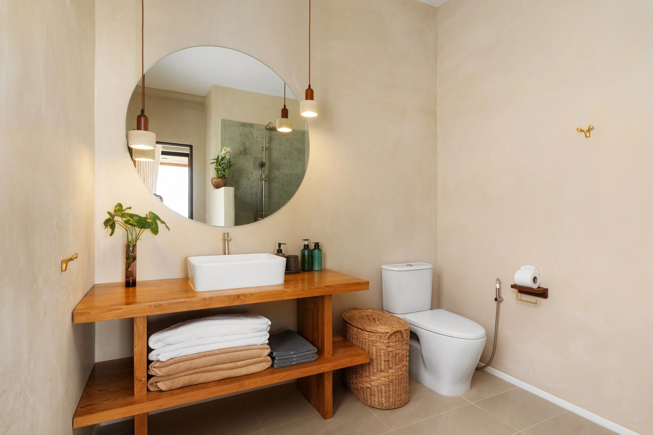 Minimalist bathroom with wood vanity representing a finished remodel
